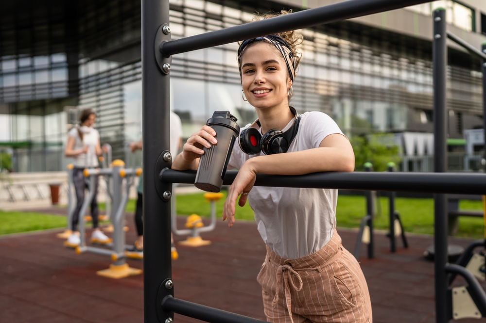 One,Caucasian,Woman,Taking,A,Brake,During,Outdoor,Training,In